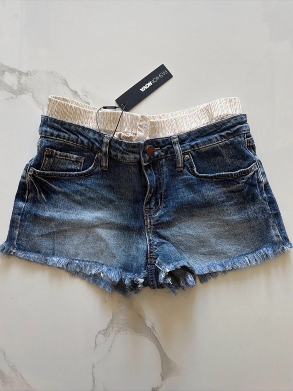 Fashion Nova Blue Denim Frayed Hem Shorts with Cream Elastic Waistband